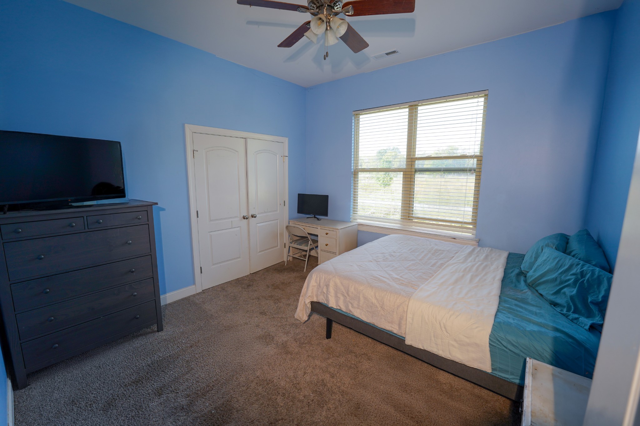 2172 Fellowship Road Mount Juliet, TN 37122 - Photo 43 of 53 a bedroom with a bed and a flat screen tv