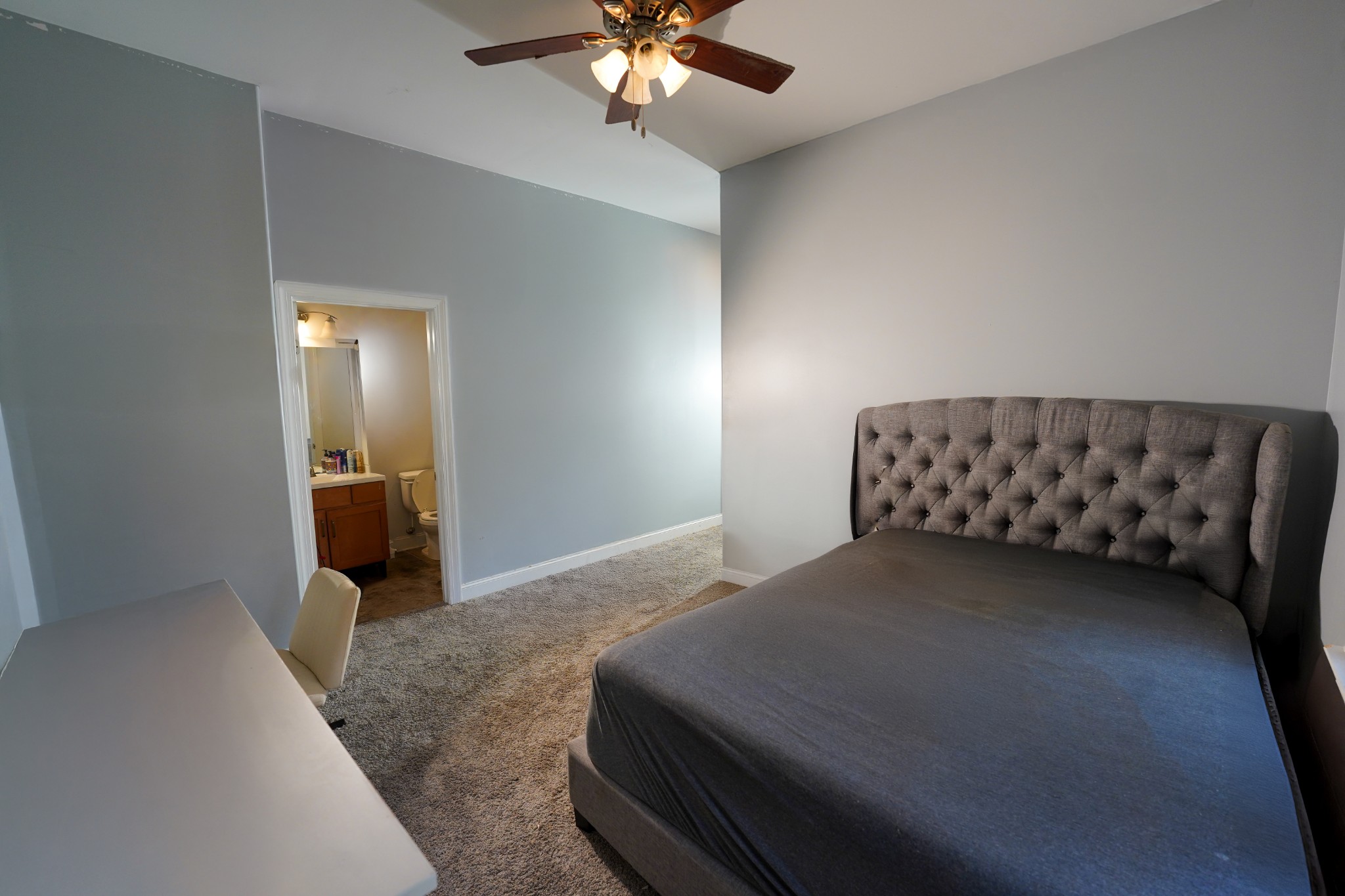 2172 Fellowship Road Mount Juliet, TN 37122 - Photo 49 of 53 a bedroom with a bed and a chandelier