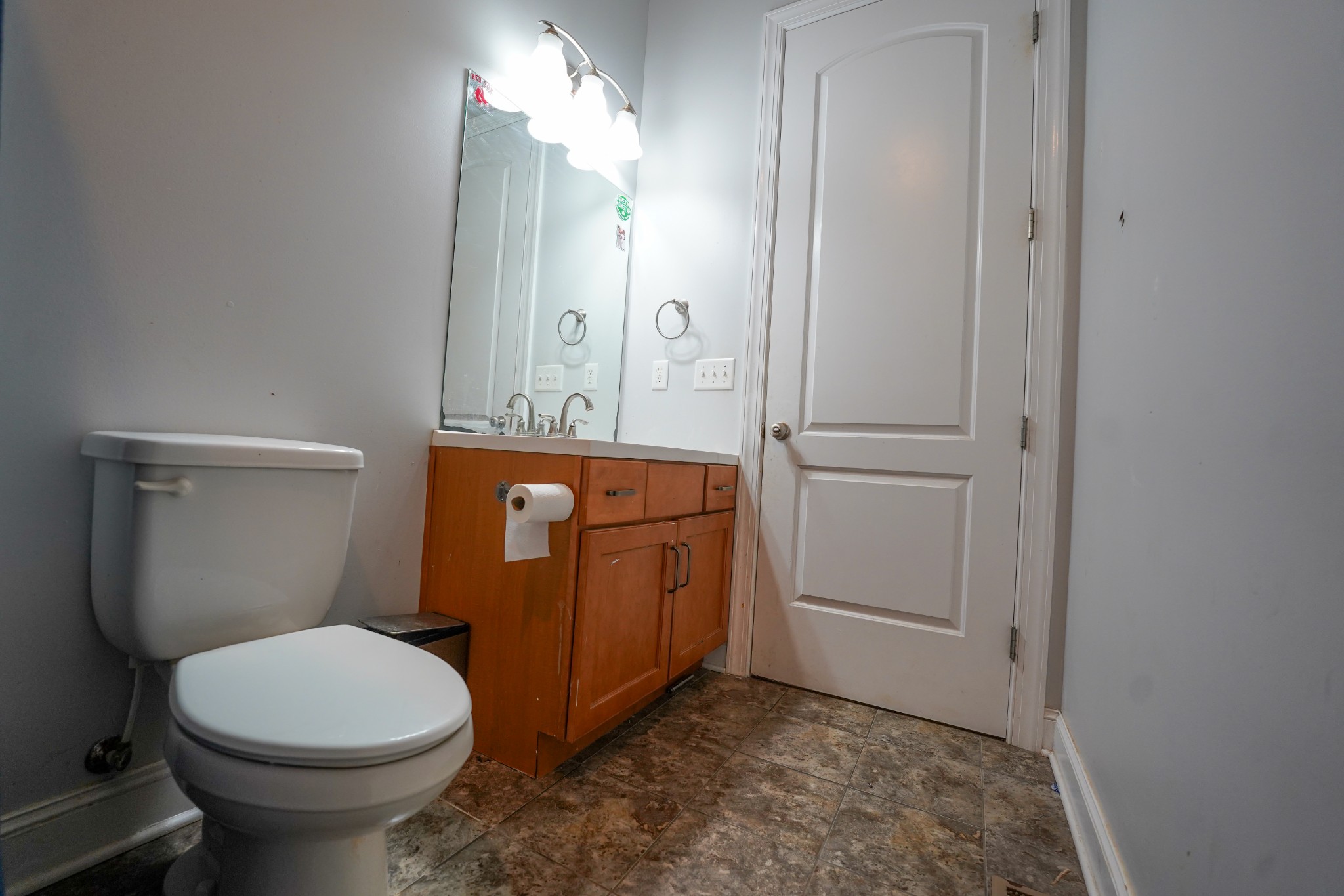 2172 Fellowship Road Mount Juliet, TN 37122 - Photo 51 of 53 a bathroom with a toilet a sink and mirror