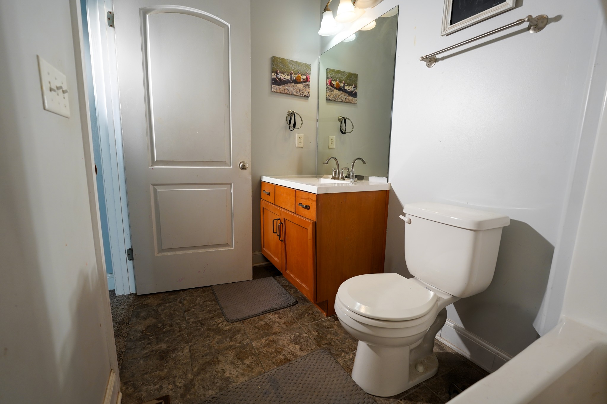 2172 Fellowship Road Mount Juliet, TN 37122 - Photo 52 of 53 a bathroom with a toilet a sink and mirror