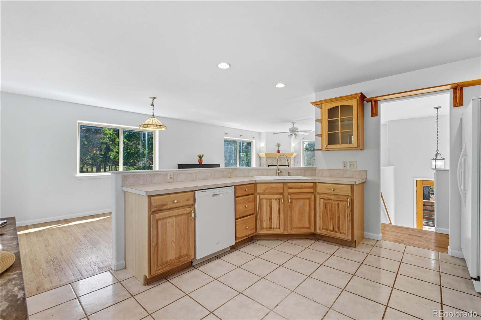 4 Gap Road Black Hawk, CO 80422 - Photo 15 of 43 a large kitchen with granite countertop a sink window and cabinets