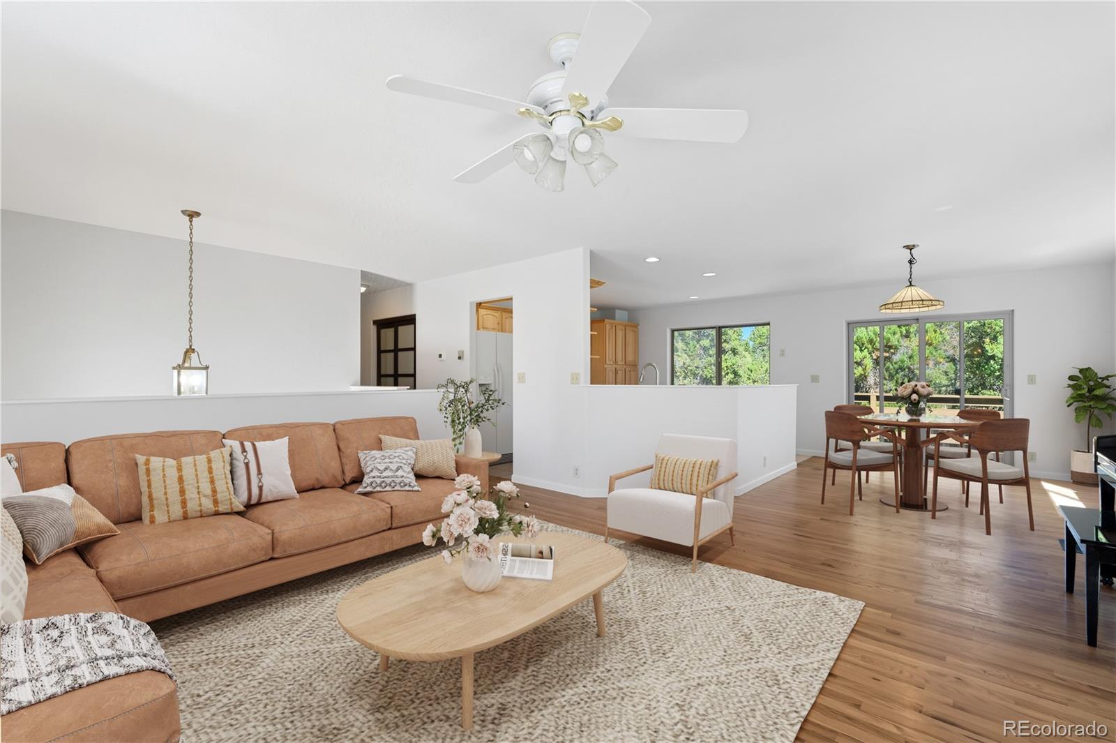4 Gap Road Black Hawk, CO 80422 - Photo 2 of 43 a living room with furniture and a wooden floor