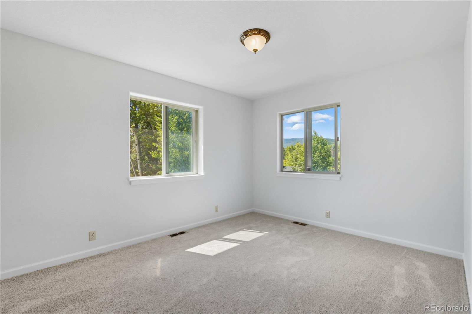 4 Gap Road Black Hawk, CO 80422 - Photo 25 of 43 an empty room with a window