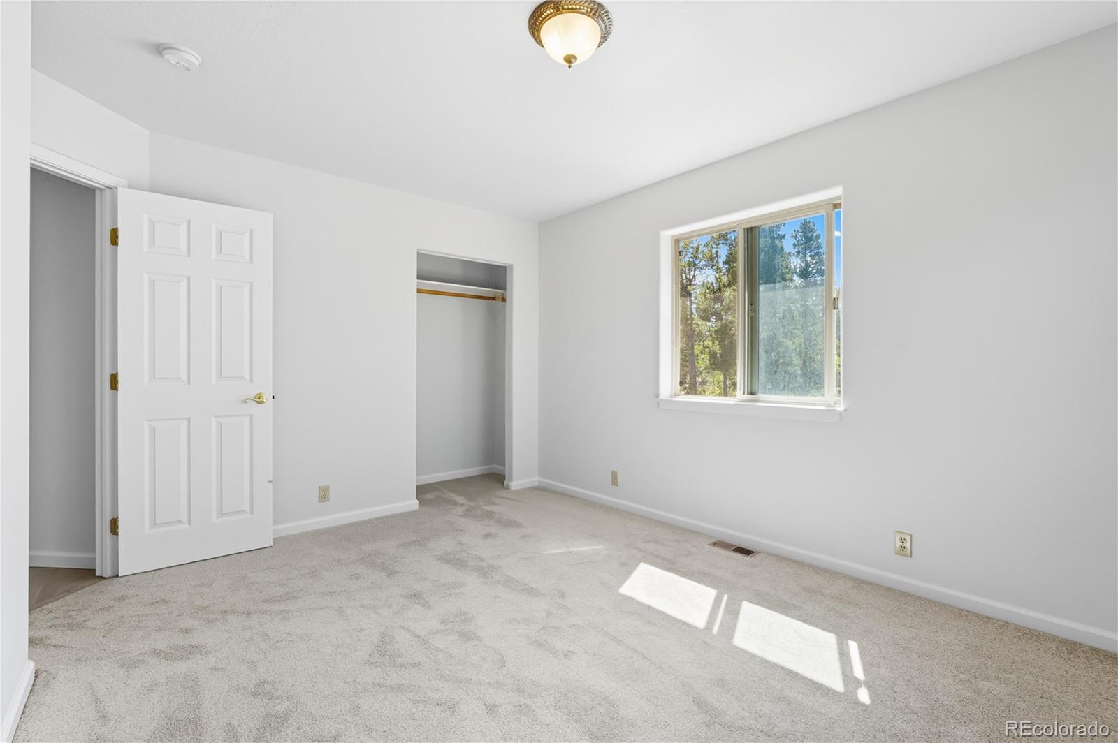 4 Gap Road Black Hawk, CO 80422 - Photo 26 of 43 a view of an empty room with a window