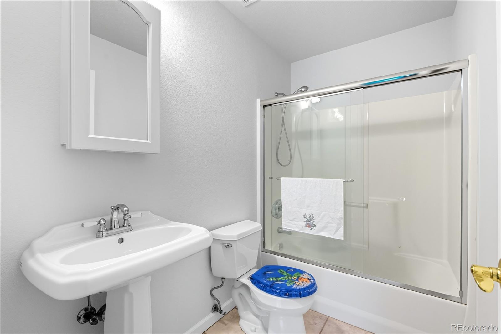 4 Gap Road Black Hawk, CO 80422 - Photo 28 of 43 a bathroom with a sink toilet and a mirror