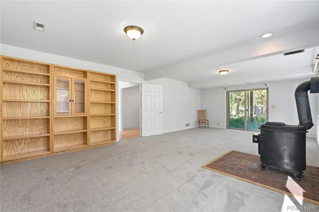 a big room with windows and closet