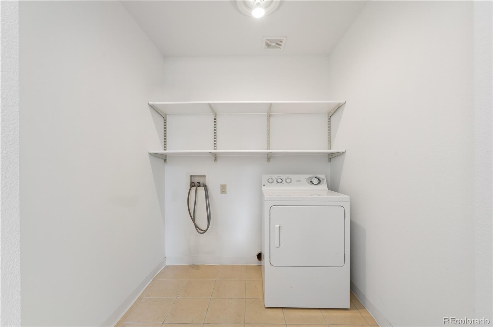 4 Gap Road Black Hawk, CO 80422 - Photo 33 of 43 a utility room with dryer and washer