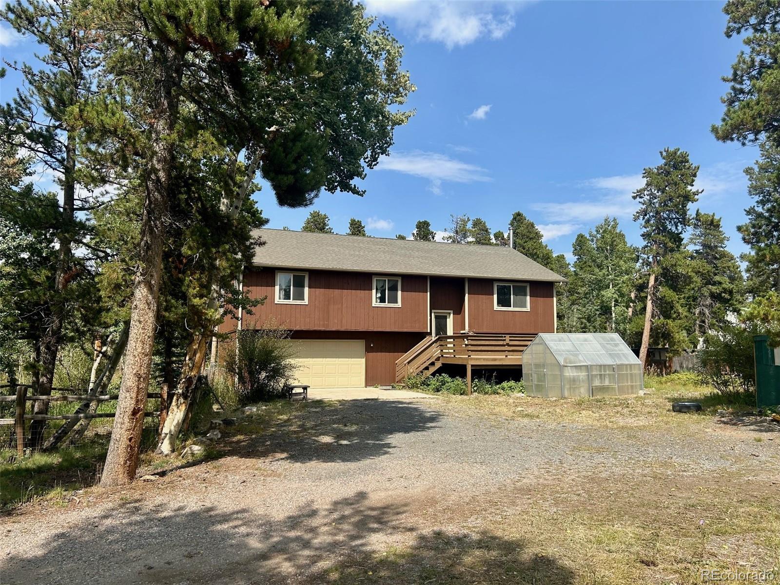 4 Gap Road Black Hawk, CO 80422 - Photo 34 of 43 a front view of a house with a yard