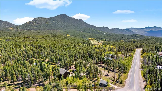 a view of a park with a sign board