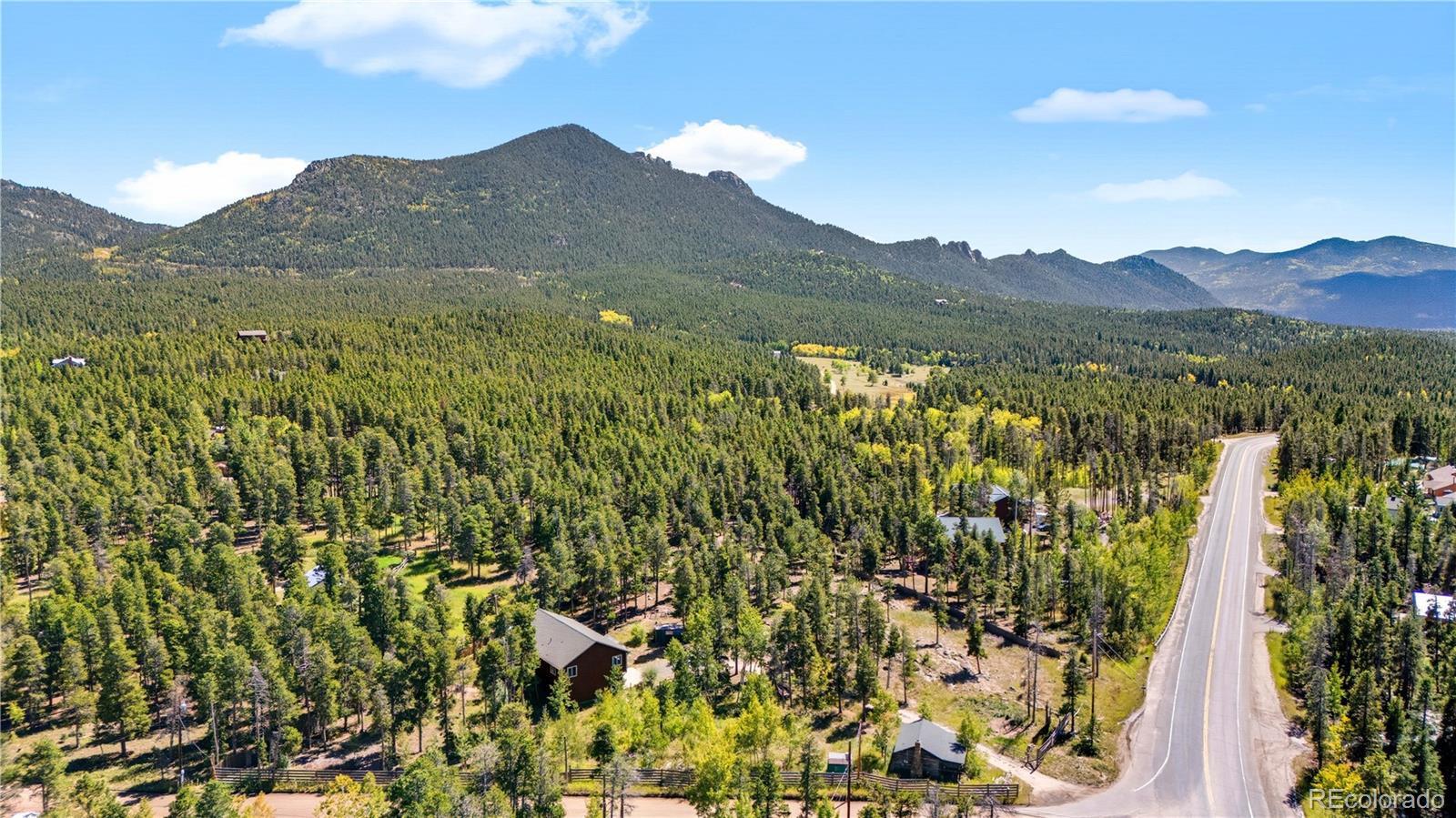 4 Gap Road Black Hawk, CO 80422 - Photo 40 of 43 a view of a lush green hillside and a mountain view