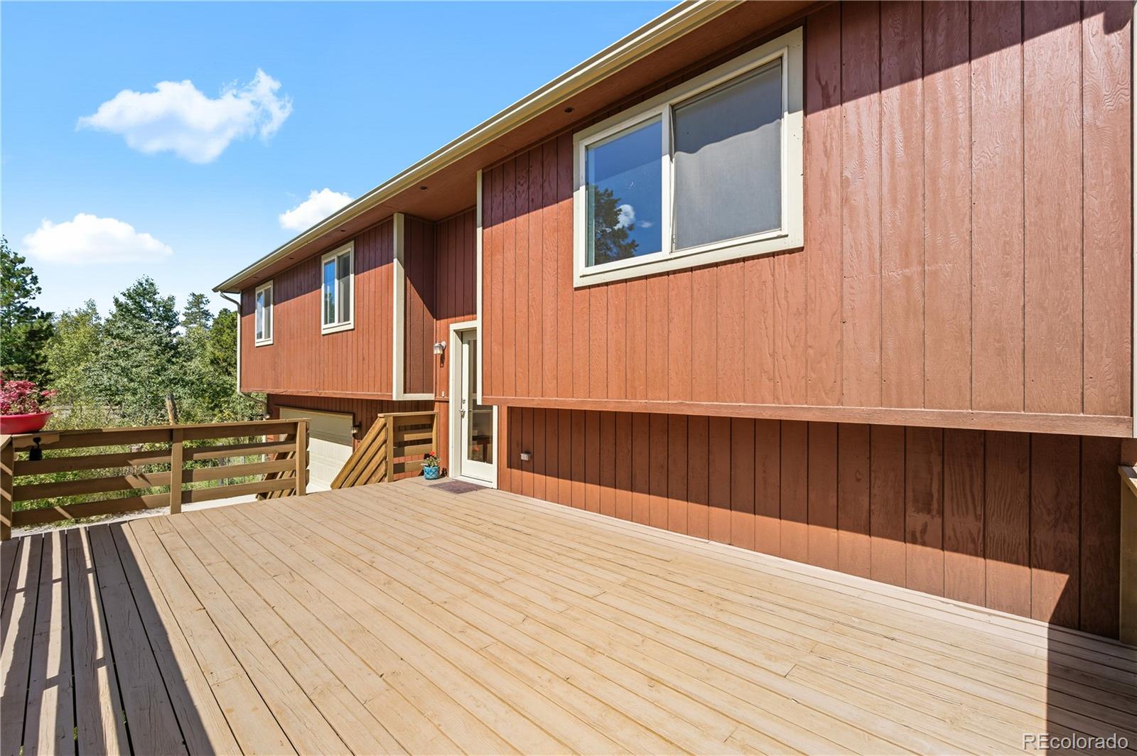 4 Gap Road Black Hawk, CO 80422 - Photo 9 of 43 a view of a house with wooden floor