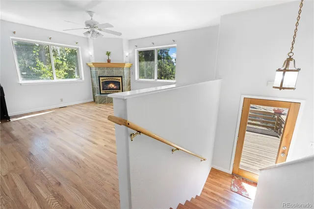 a kitchen with a sink a stove cabinets and a refrigerator