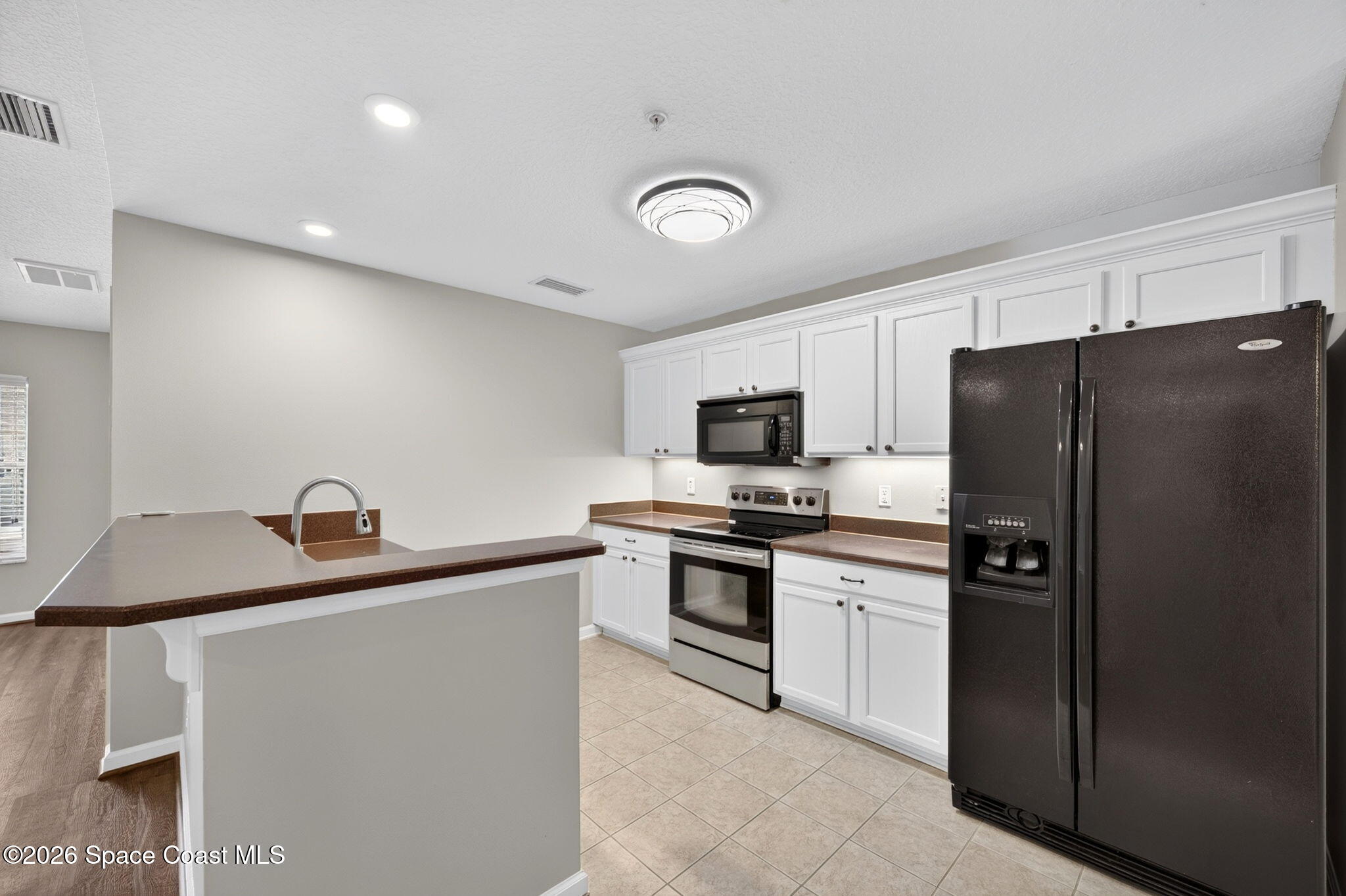 4107 Meander Place, Unit 203 Rockledge, FL 32955 - Photo 6 of 35 DSC_2552