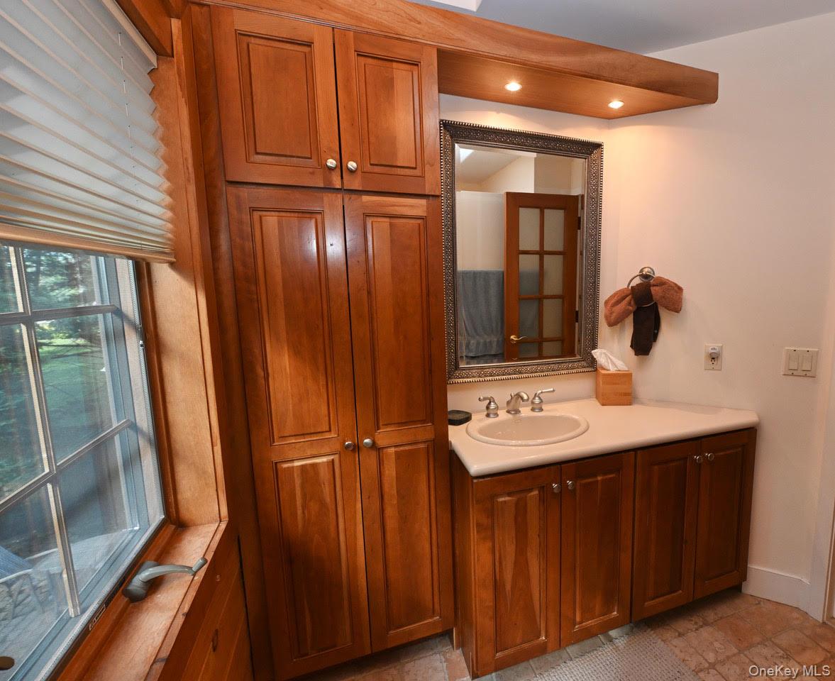 216 5th Street St. James, NY 11780 - Photo 16 of 21 Bathroom featuring vanity