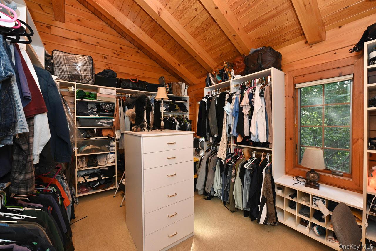 216 5th Street St. James, NY 11780 - Photo 18 of 21 Spacious closet with light colored carpet