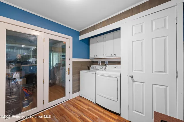 a bathroom with a toilet a sink and a mirror