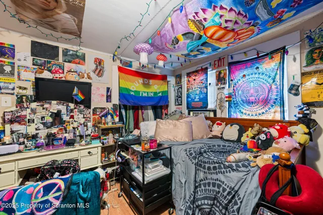 a bedroom with a bed and closet