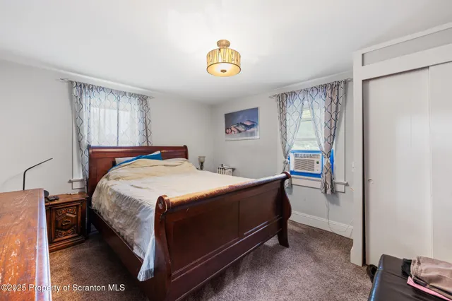 a view of a hallway with closet