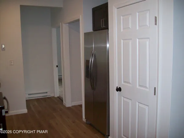 a view of a livingroom from a hallway