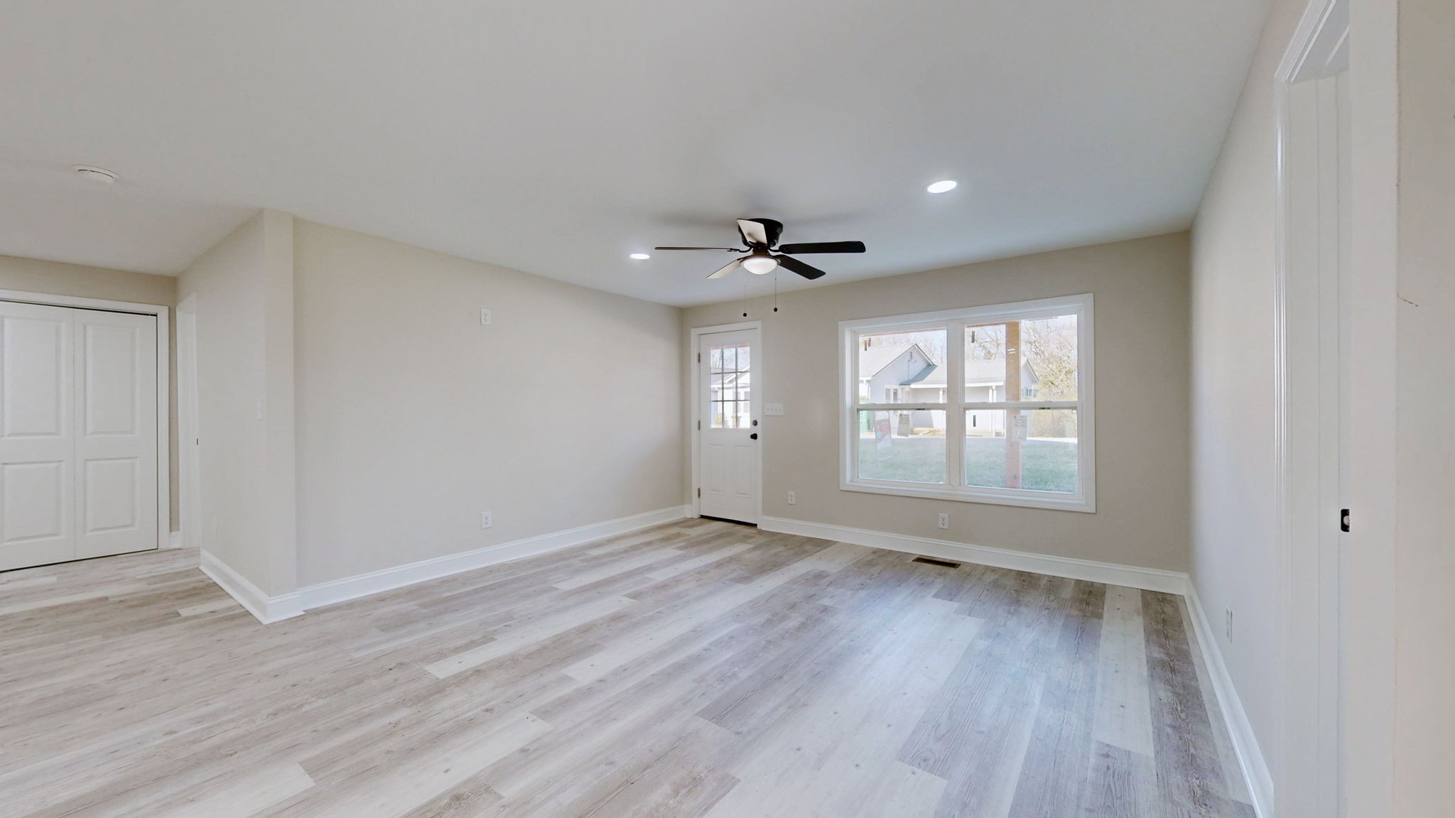109 Wells Street Centerville, TN 37033 - Photo 4 of 19 wooden floor in an empty room with a window