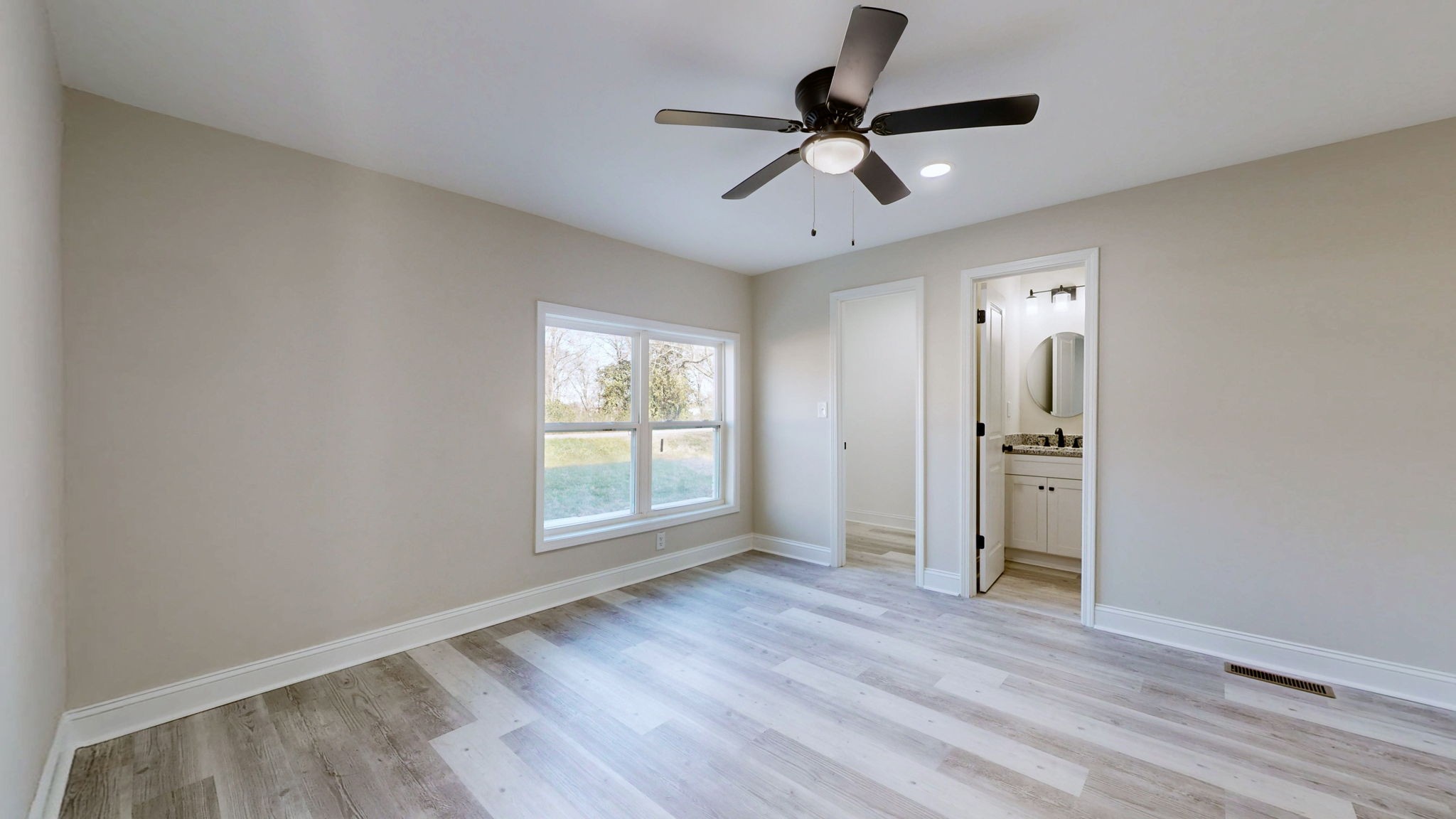 109 Wells Street Centerville, TN 37033 - Photo 10 of 19 a view of empty room with wooden floor and fan