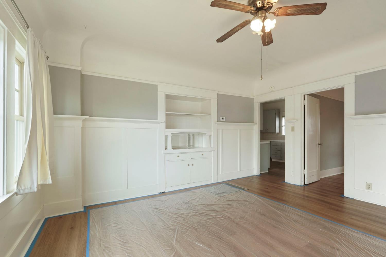 400 Chestnut Street Lodi, CA 95240 - Photo 22 of 36 a view of empty room with wooden floor and window