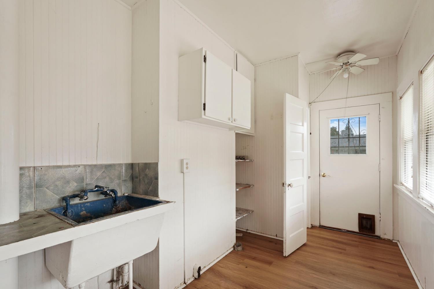 400 Chestnut Street Lodi, CA 95240 - Photo 28 of 36 a kitchen with stainless steel appliances a white cabinet and a granite counter tops