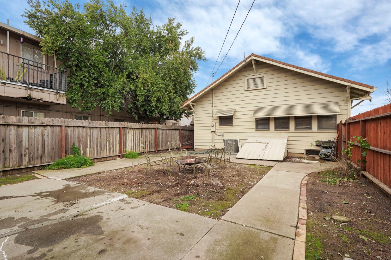 400 Chestnut Street Lodi, CA 95240 - Photo 31 of 36 a front view of a house with yard and seating area