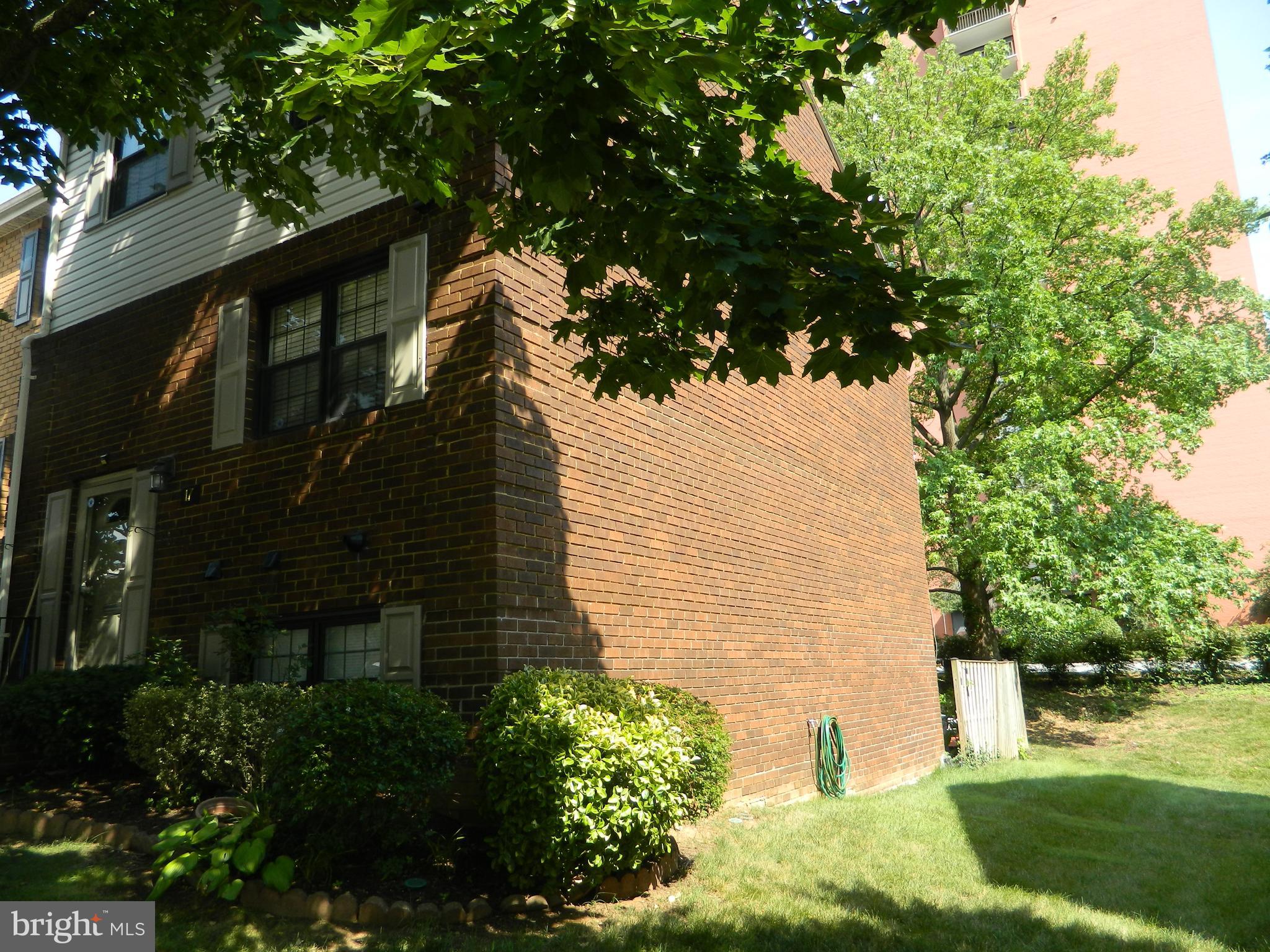 17 Theo Lane, Unit 17 Towson, MD 21204 - Photo 2 of 54 a backyard of a house with lots of green space