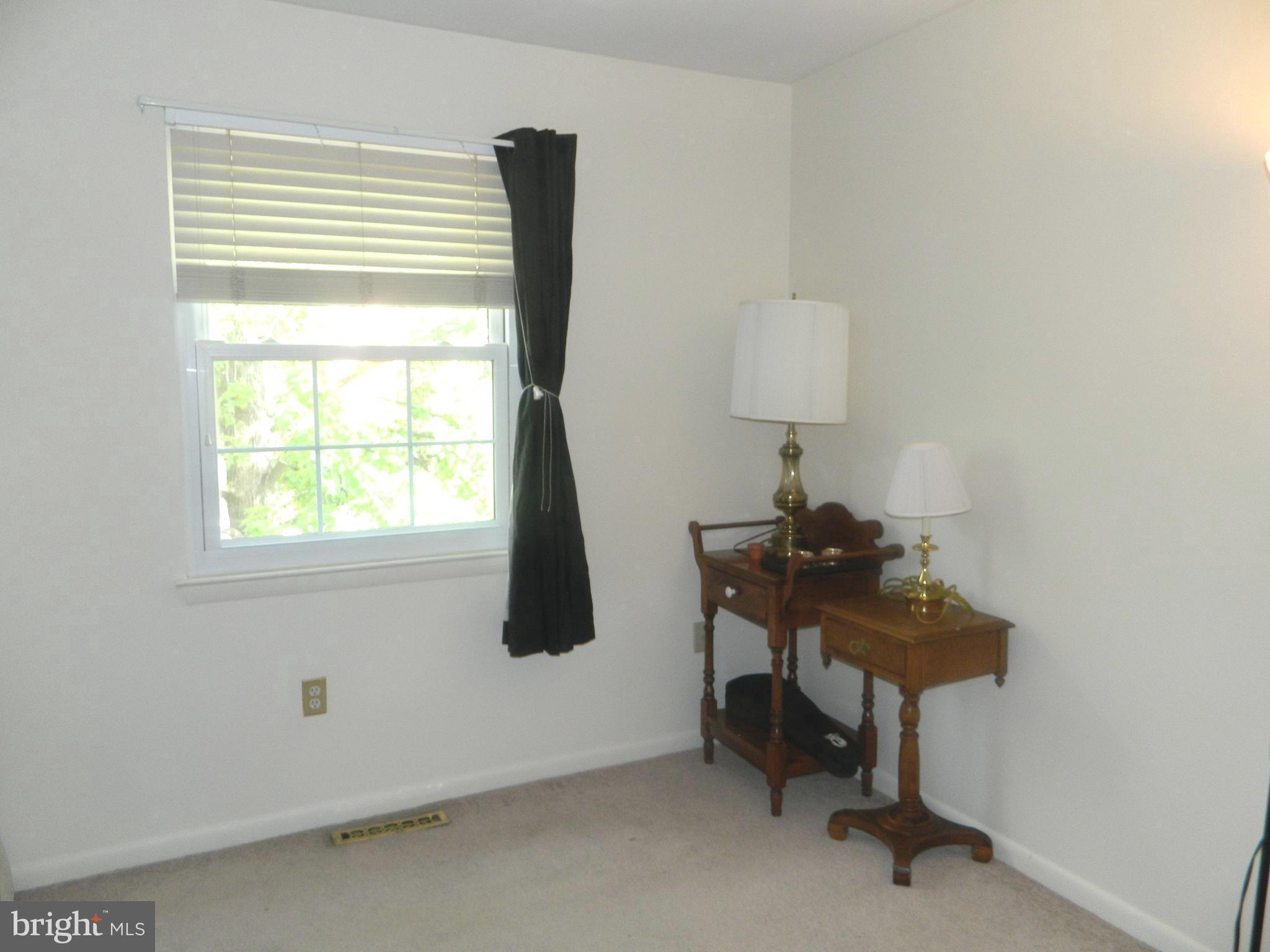 17 Theo Lane, Unit 17 Towson, MD 21204 - Photo 23 of 54 a view of a workspace with furniture and a window