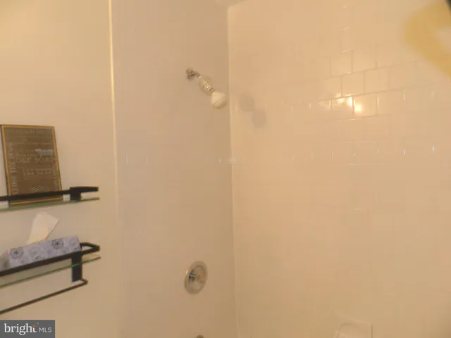 a view of staircase with white walls