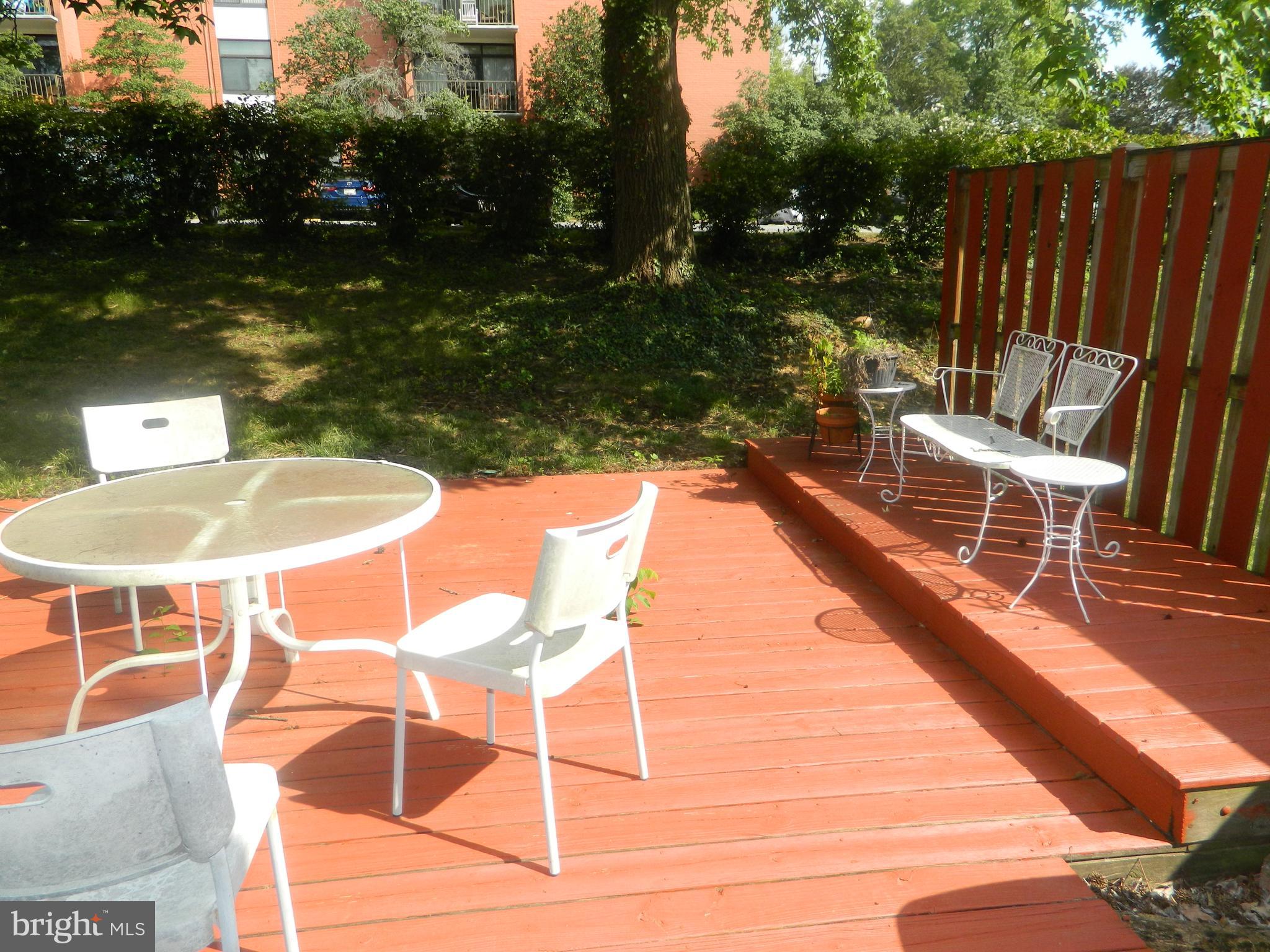 17 Theo Lane, Unit 17 Towson, MD 21204 - Photo 50 of 54 a balcony with table and chairs