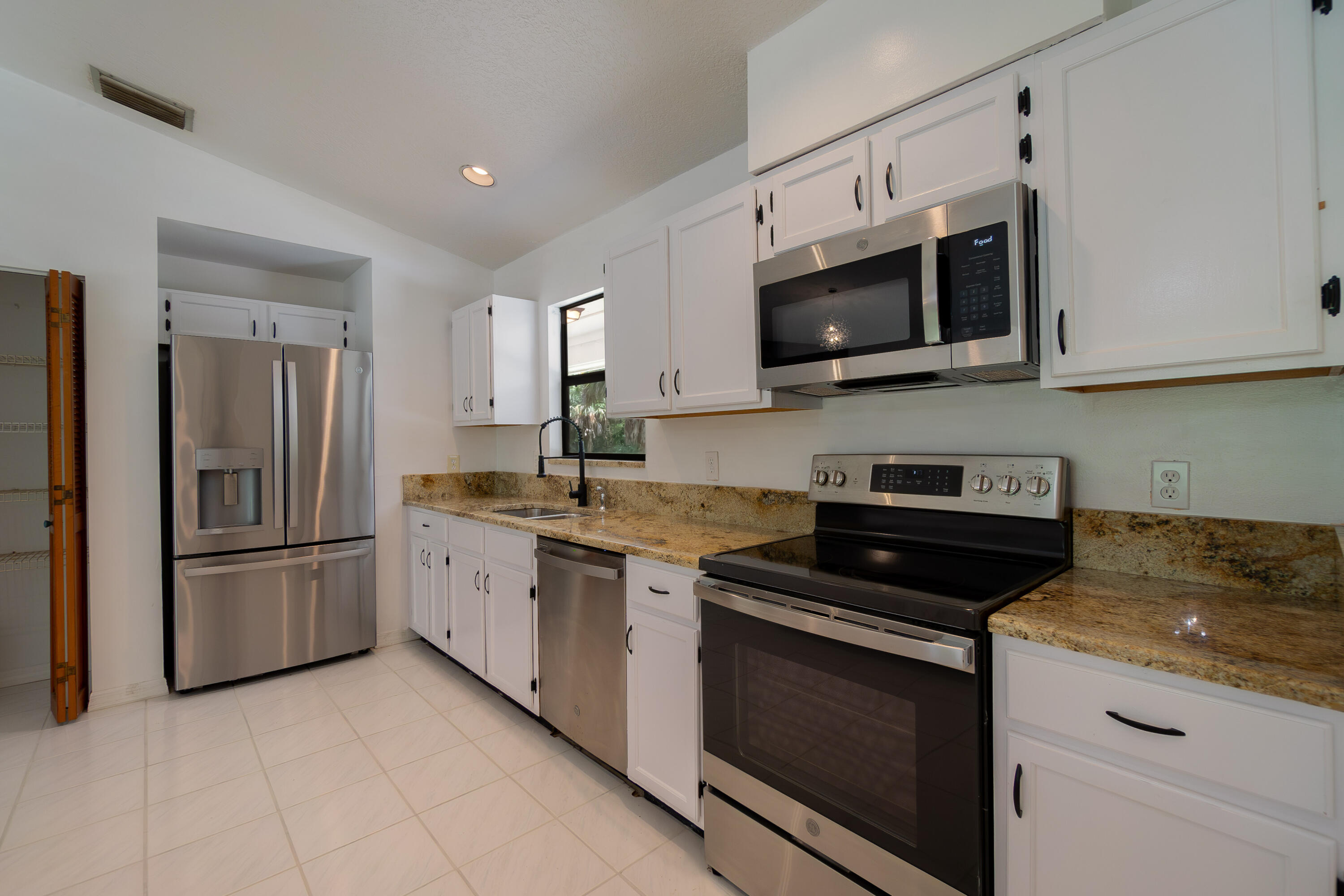 12845 Compton Road Loxahatchee Groves, FL 33470 - Photo 3 of 15 DSC07691-Enhanced-NR