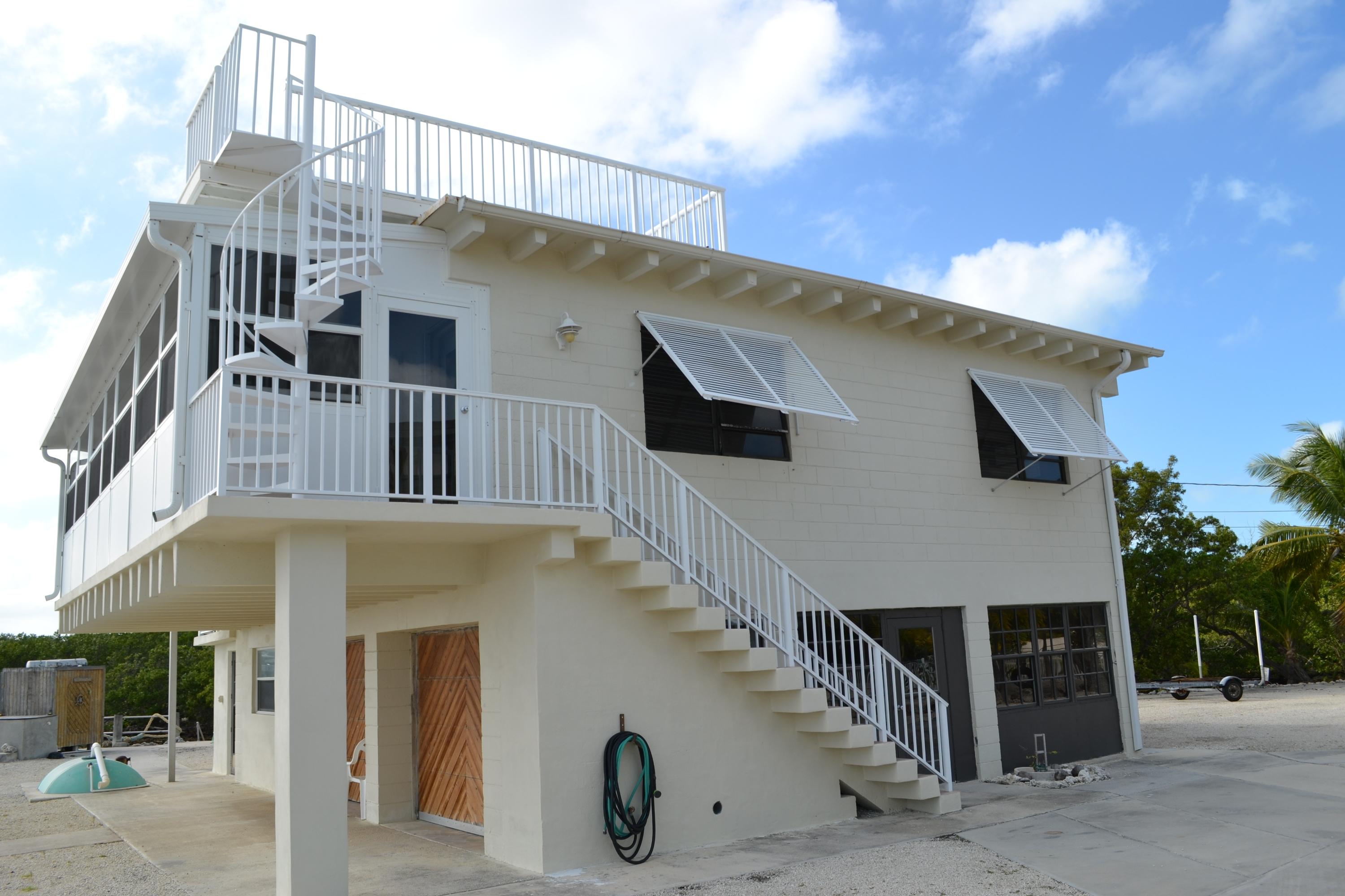 30 East Beach Road Tavernier, FL 33070 - Photo 2 of 26 Side of House