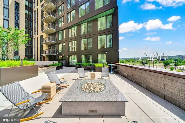 a view from a balcony with furniture