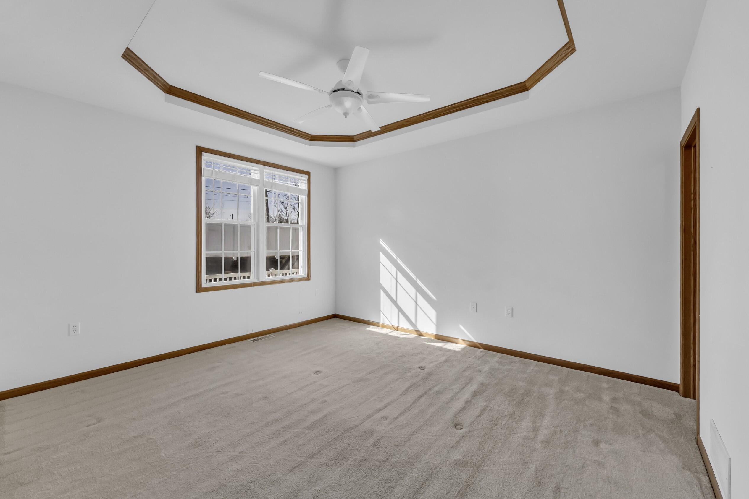2781 Edwards Street, Unit D East Troy, WI 53120 - Photo 14 of 32 Tray Ceiling in Primary BR