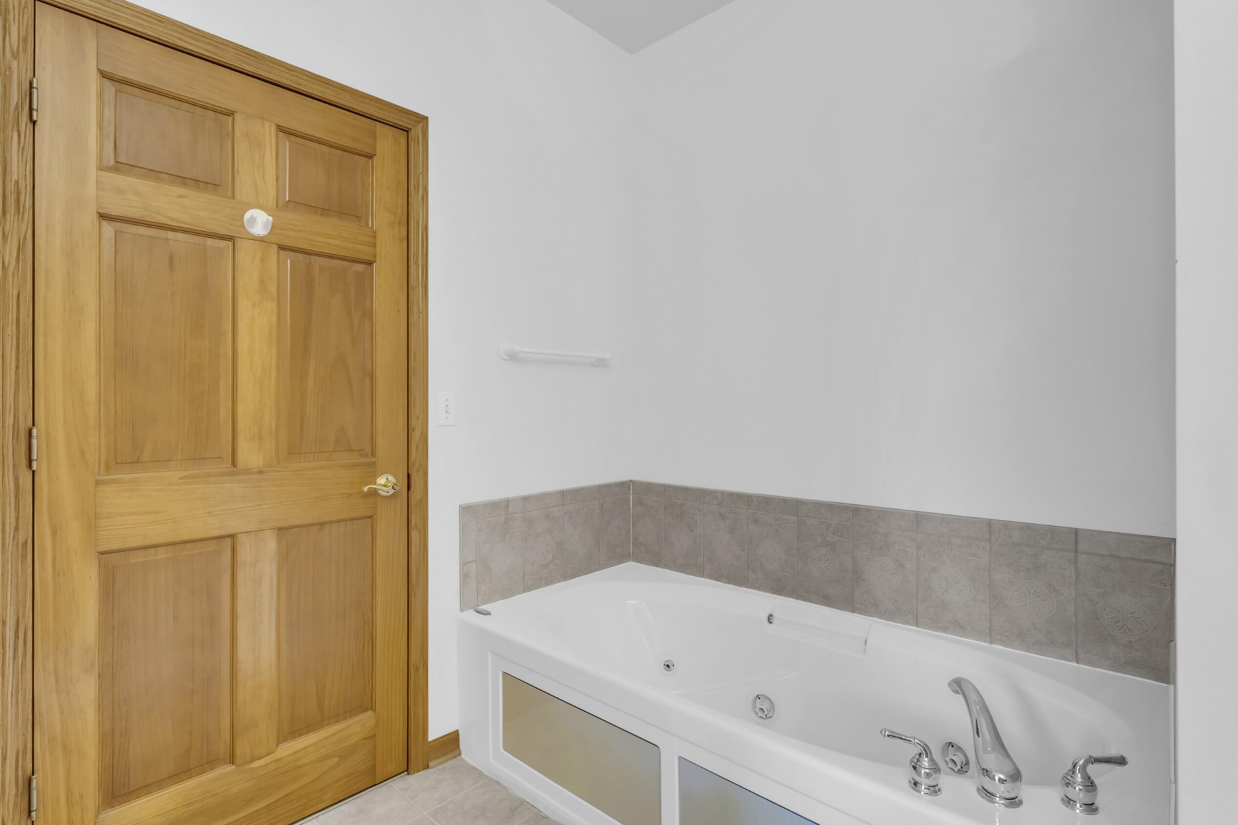 2781 Edwards Street, Unit D East Troy, WI 53120 - Photo 20 of 32 Jetted tub