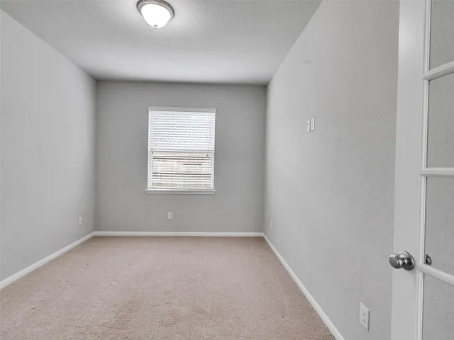 an empty room with a window