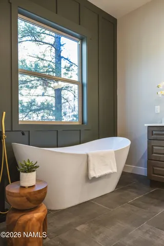 a very nice looking room with a ceiling fan