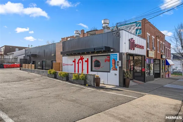 a view of a street with cars