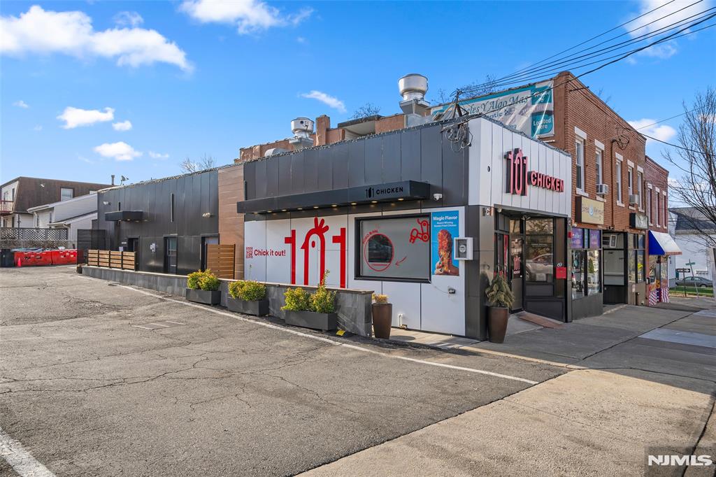 69-71 Ridgefield Avenue Ridgefield Park, NJ 07660 - Photo 1 of 37 a view of a street with cars