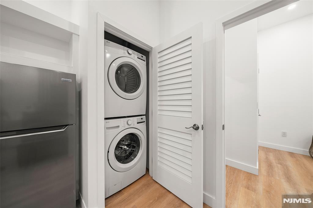 69-71 Ridgefield Avenue Ridgefield Park, NJ 07660 - Photo 23 of 37 a utility room with dryer and washer