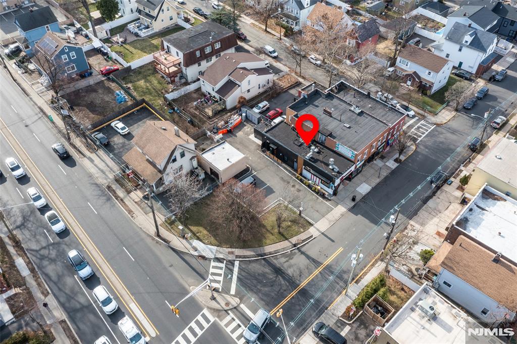 69-71 Ridgefield Avenue Ridgefield Park, NJ 07660 - Photo 30 of 37 an aerial view of residential houses with outdoor space