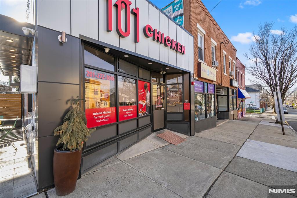 69-71 Ridgefield Avenue Ridgefield Park, NJ 07660 - Photo 3 of 37 a view of street with an entrance and building