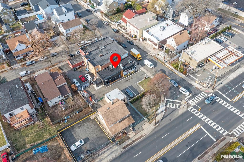 69-71 Ridgefield Avenue Ridgefield Park, NJ 07660 - Photo 34 of 37 an aerial view of residential house with parking