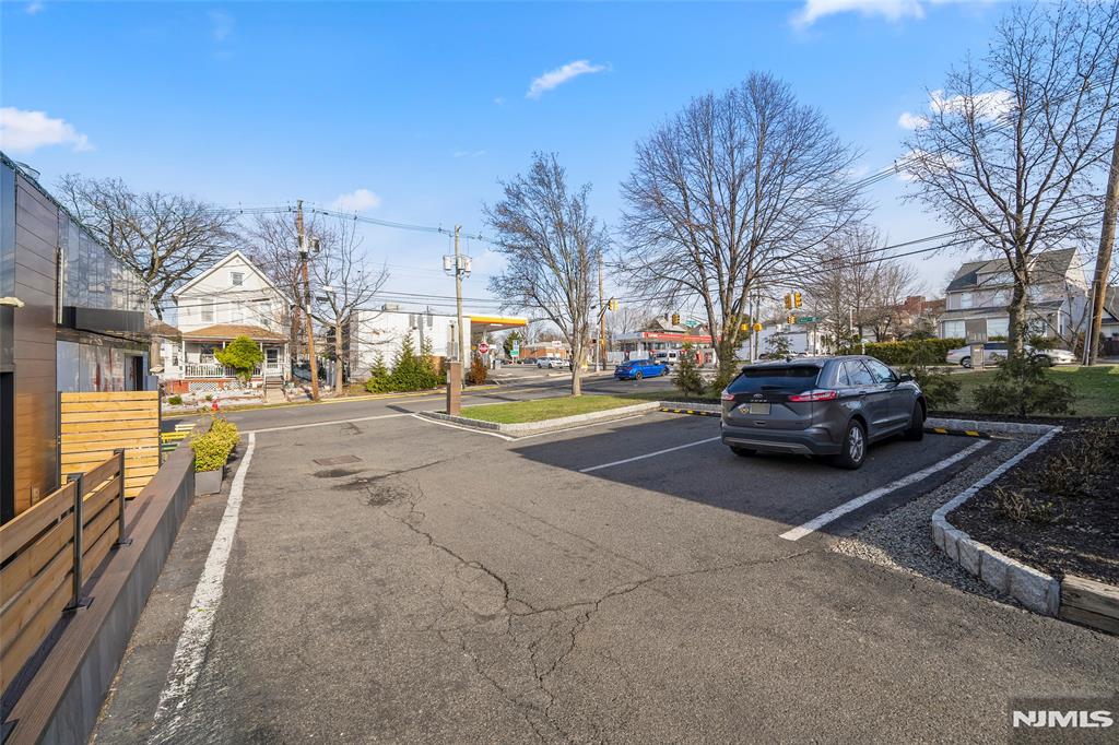 69-71 Ridgefield Avenue Ridgefield Park, NJ 07660 - Photo 6 of 37 a view of a street with cars on both side