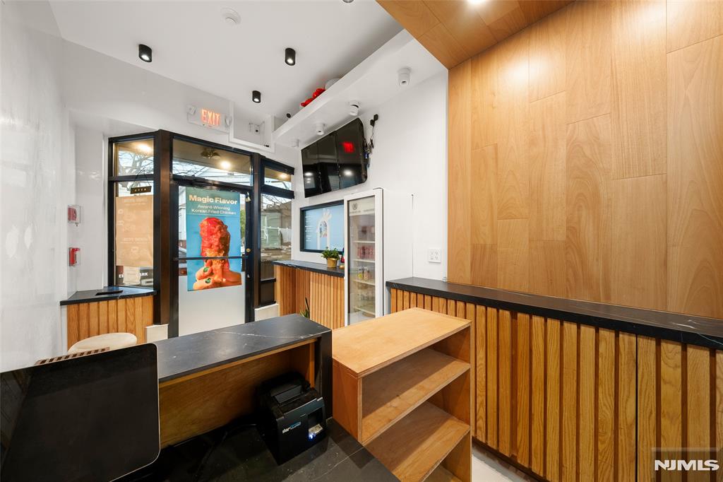 69-71 Ridgefield Avenue Ridgefield Park, NJ 07660 - Photo 10 of 37 a view of a hallway with seating area