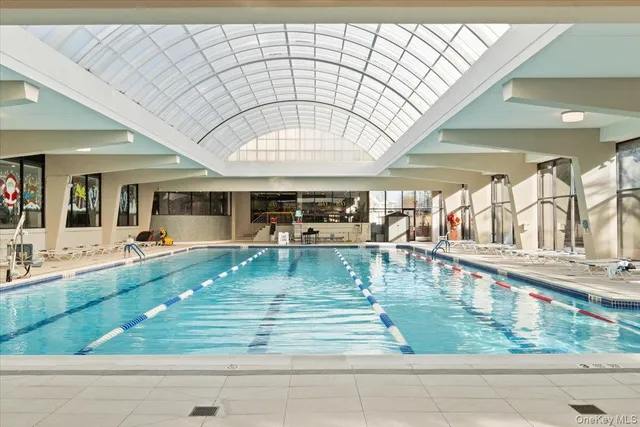 wooden floor with a swimming pool