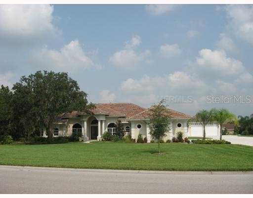 Exterior Front - Gorgeous 4450 sf "1"story on 1.3 acres. Adj. to Preserve!