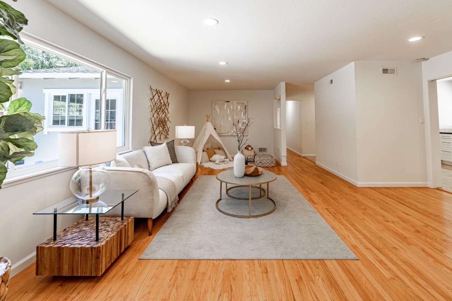 30432 Treeview Street Hayward, CA 94544 - Photo 12 of 35 a living room with furniture and a wooden floor